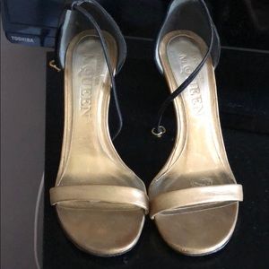 Alexander McQueen gold and black stiletto sandals